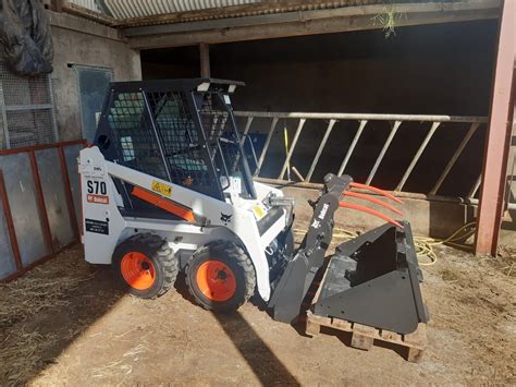 what's the smallest bobcat skid steer|small skid steer with tracks.